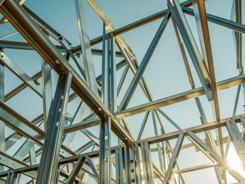 Building Steel Skeleton Frame at Sunset. Modern Building Structure Technologies.